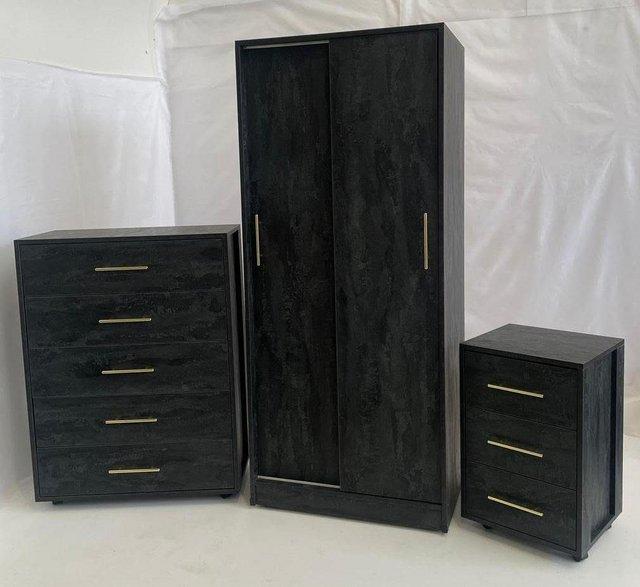 Preview of the first image of AERO BLACK STONE EFFECT SLIDING WARDROBE CHEST AND BEDSIDE.