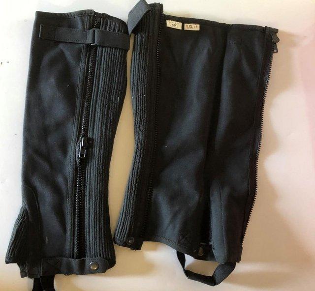 Preview of the first image of New XL Black Suede Half Chaps Never Been Worn.