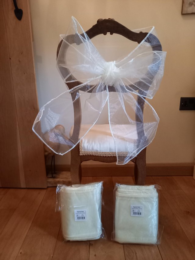 Preview of the first image of Ivory organza chair tie backs. Suitable for weddings birthda.