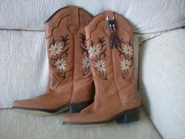 Preview of the first image of Ladies Brown pigskin Western boots.