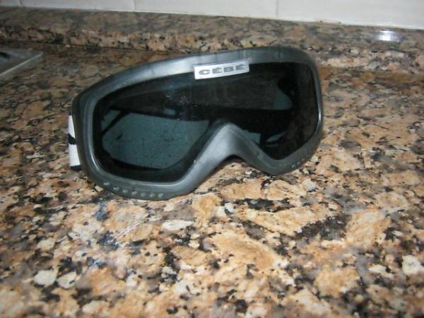 Image 2 of Men's ski helmet by Smith and goggles
