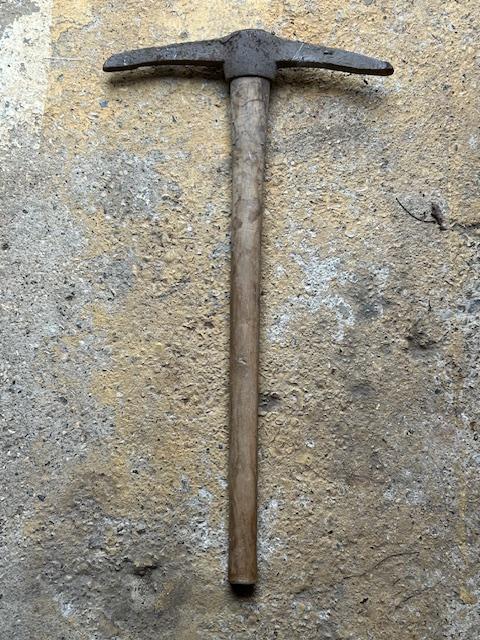 Preview of the first image of Vintage Pick Axe with wooden Handle.