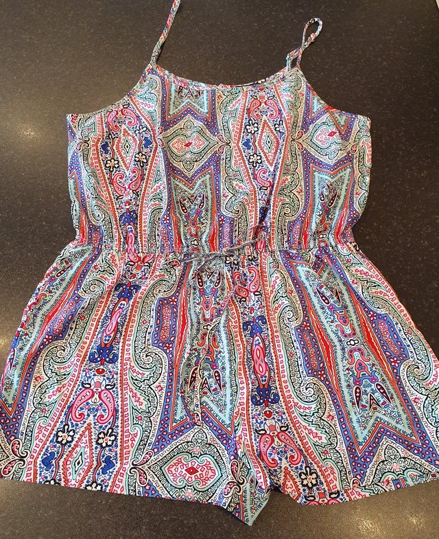 Preview of the first image of Aztec print playsuit romper, size 18/20.