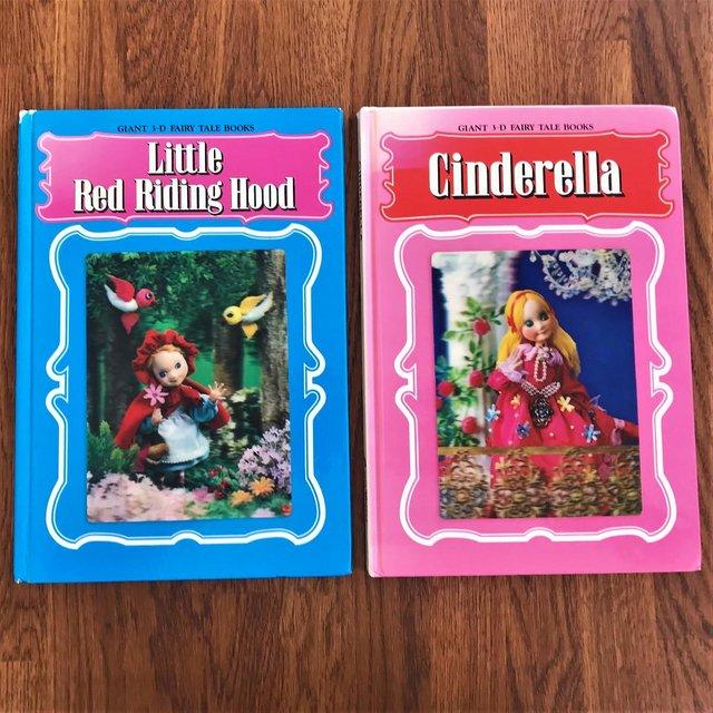 Preview of the first image of 2 vintage 3-D holograph books:Cinderella & Little Red Riding.