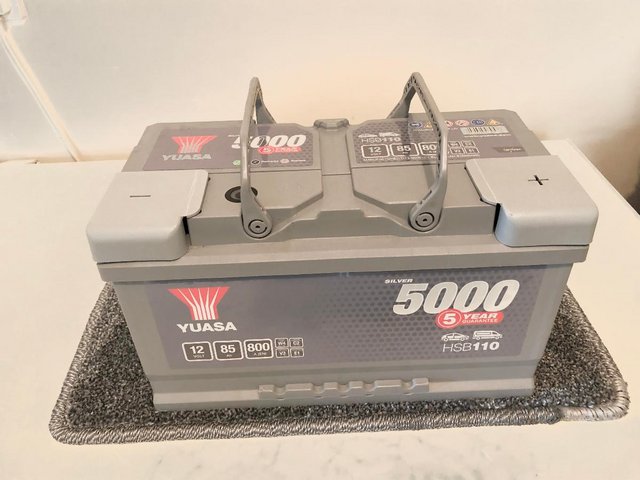 Preview of the first image of NEW YUASA 5000 HSB 110 12V 85 AMP HRS VEHICLE BATTERY.