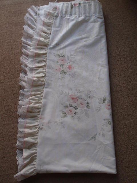 Preview of the first image of 1 Pair of White Flowered Curtains.