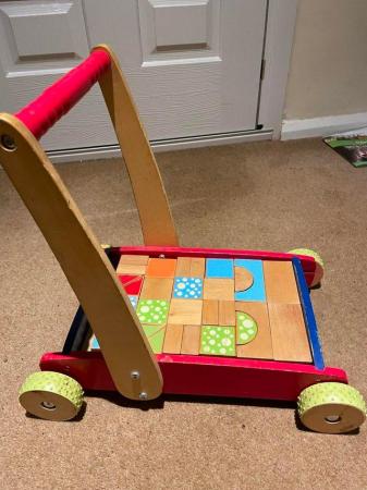 Image 2 of childs wooden trolley with various shaped wooden blocks