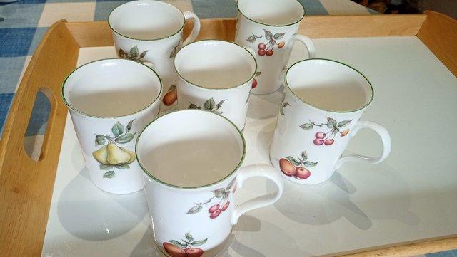 Preview of the first image of 6 pretty bone china mugs also separate advert similar mugs.