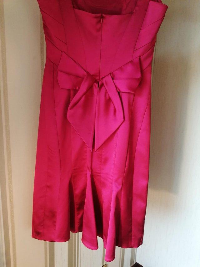 Preview of the first image of Karen Millen ladies dress. Size UK 12.