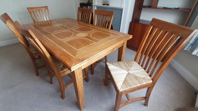 Preview of the first image of M&S Solid wood dining table, 6 chairs plus sideboard.
