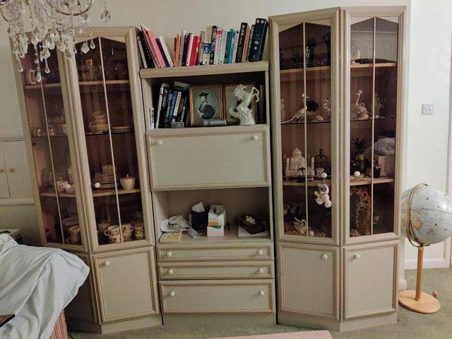 Preview of the first image of Marvellous light coloured woodgrain effect wall units!.