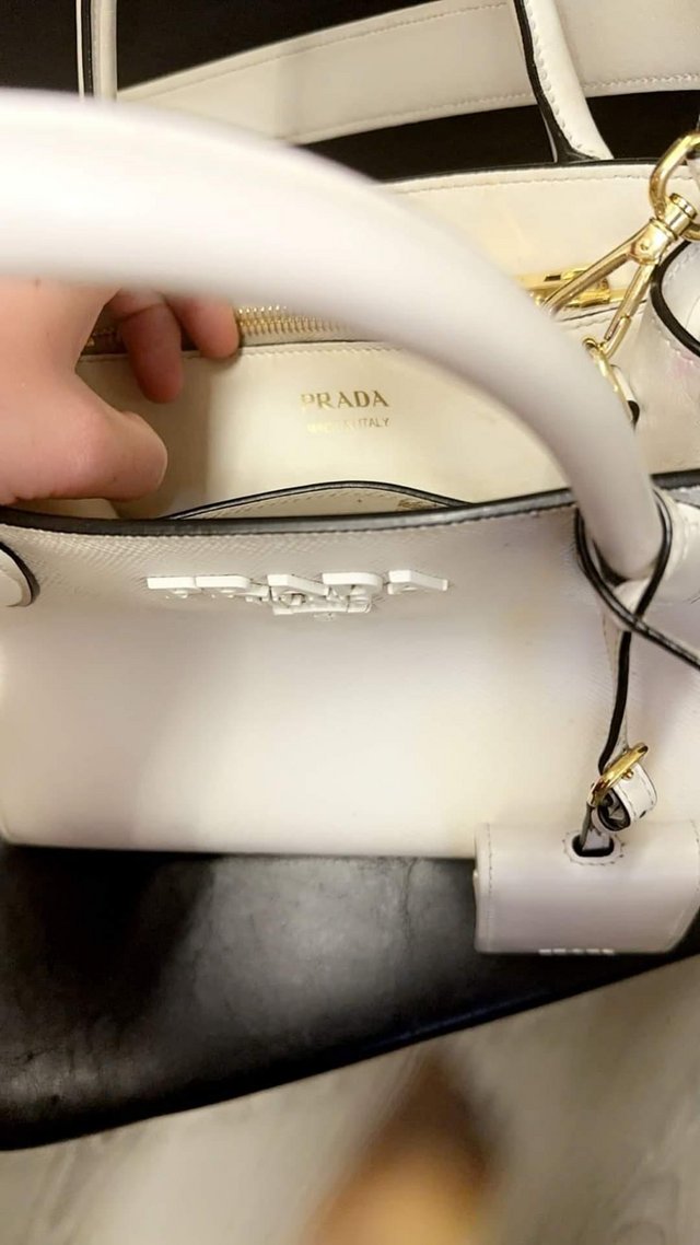 Preview of the first image of Designer handbag white used once.