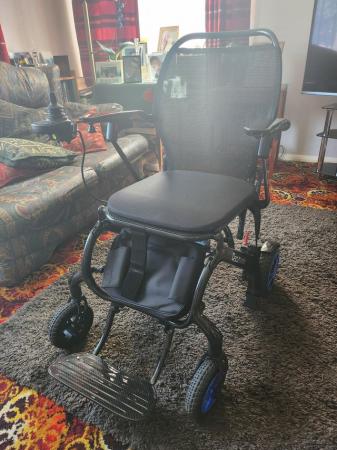 Image 3 of Electric wheel chair brand new used once