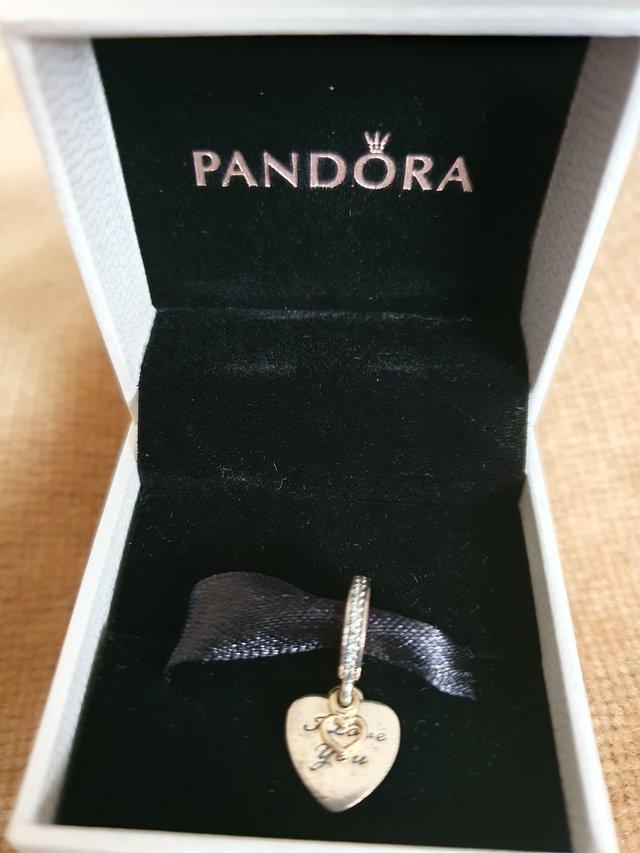 Preview of the first image of Pandora silver moments I Love You heart dangle charm.