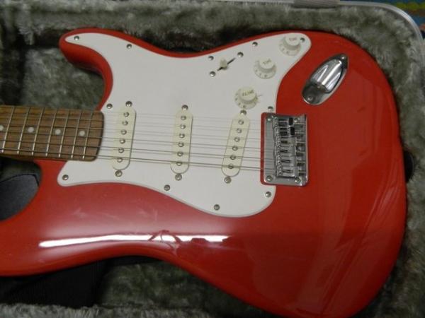 Image 1 of Fender Squire guitar with carrying case and amplifier
