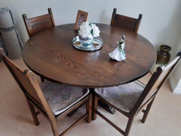 Image 3 of Solid Oak dining table/4 chairs and a Sideboard