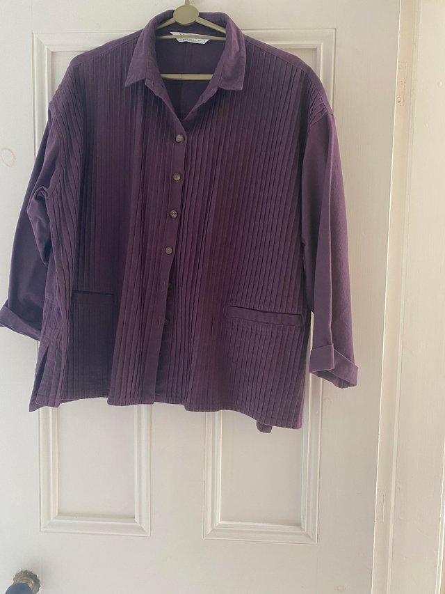 Preview of the first image of Plum coloured Yacco Maricard cotton jacket.