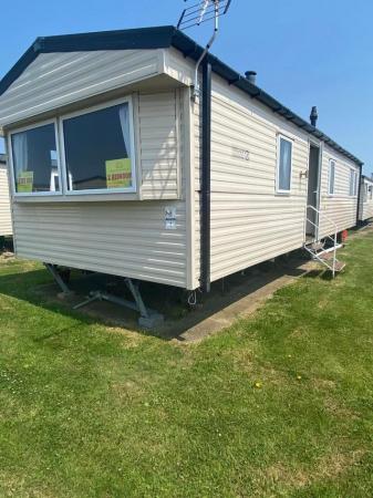 Image 2 of £33k.Reduced quality holiday home.No site fees until 2026