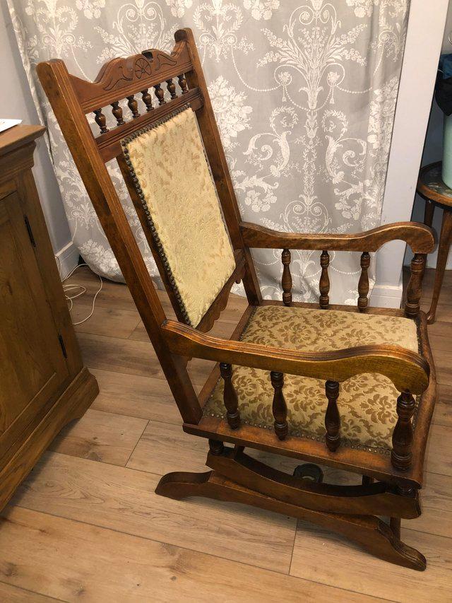 Antique platform rocking store chair