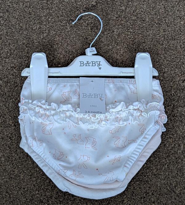 Preview of the first image of Bnwt Pack Of 3 Pink Mix Frilled Baby Knickers - 3/6 Months.