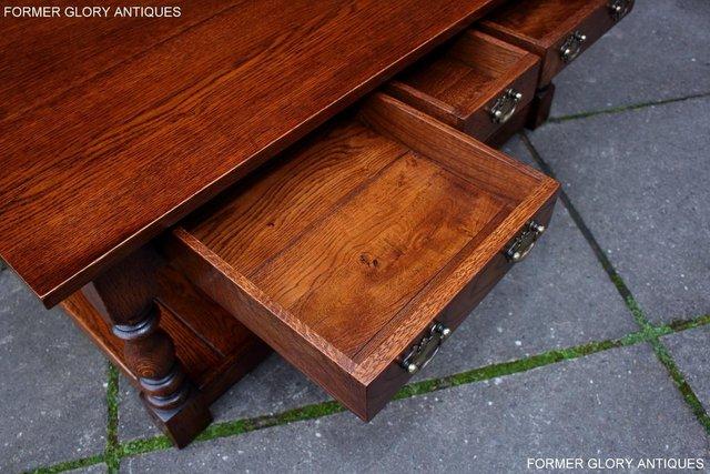 Image 32 of TAYLOR & Co STRESSED OAK THREE DRAWER POTBOARD COFFEE TABLE