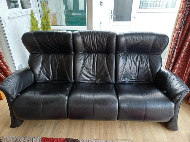 Preview of the first image of Himolla 3 seater black leather sofa.