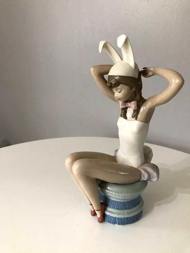 Preview of the first image of Lladro NAO Bunny Girl Retired Figurine.