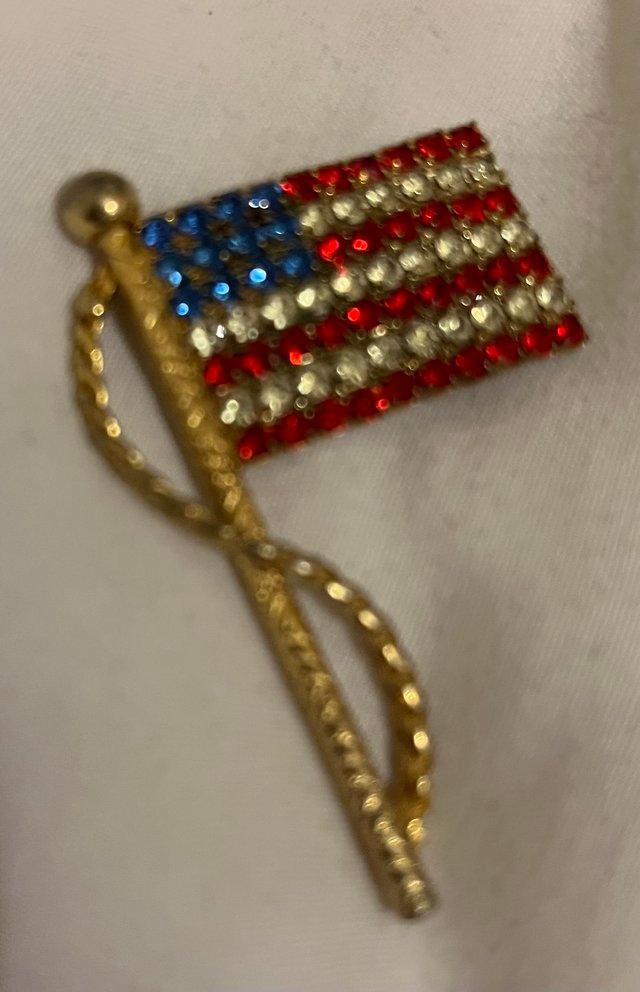 Preview of the first image of 1990s US flag rhinestone brooch.