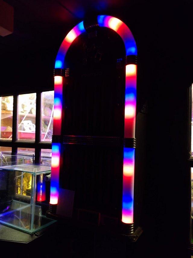 Preview of the first image of LARGE BLUETOOTH JUKE BOX WITH RADIO AND LIGHTS.