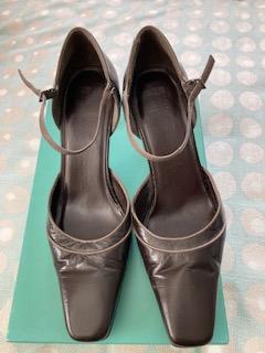 Preview of the first image of M&S ladies, brown trim leather heeled shoes.