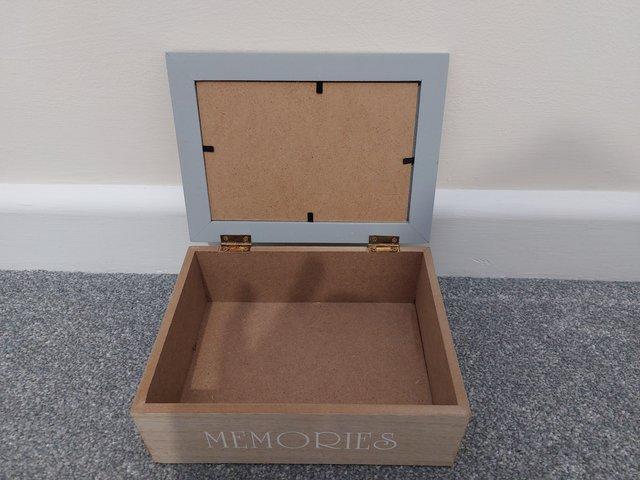 Preview of the first image of Wooden memory box with photo lid- never used.