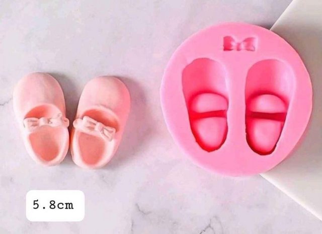 Preview of the first image of Silicone mould - baby shoes - never used.