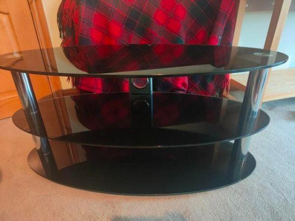 Image 1 of Television Stand...Black Glass and Chrome