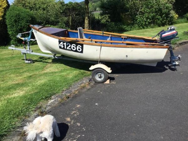 Image 1 of 12ft fibre glass boat with winched trailer