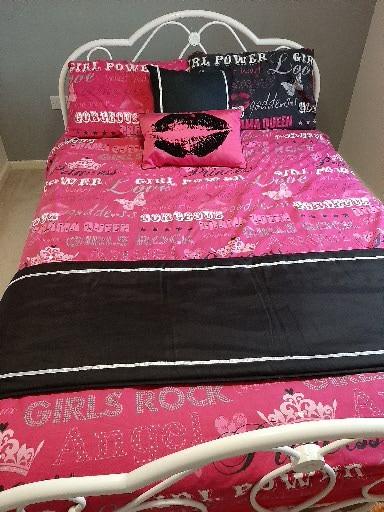Preview of the first image of Girl Power Reversible Pink & Black Duvet Set.