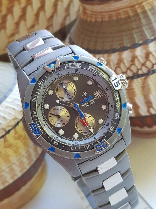 Preview of the first image of Mens fila titanium chronograph quartz watch.