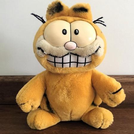 Image 1 of Vintage 1980's Garfield plush toy, exposed teeth. 9" tall.