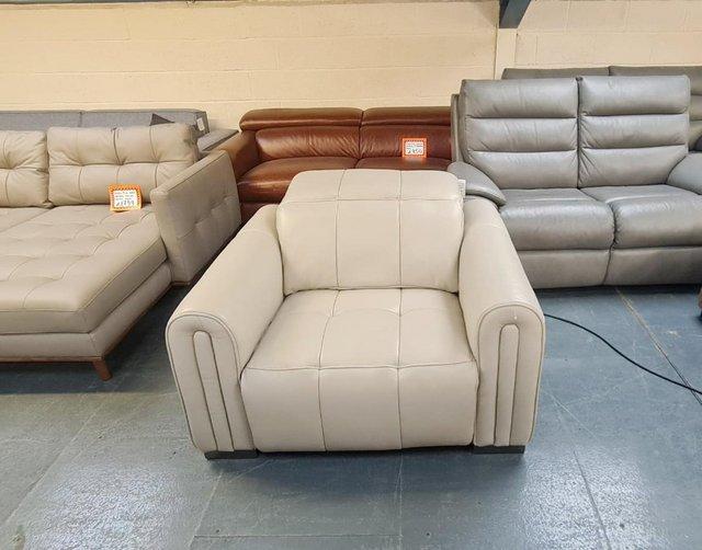 Preview of the first image of Alessio light grey/cream electric recliner armchair.