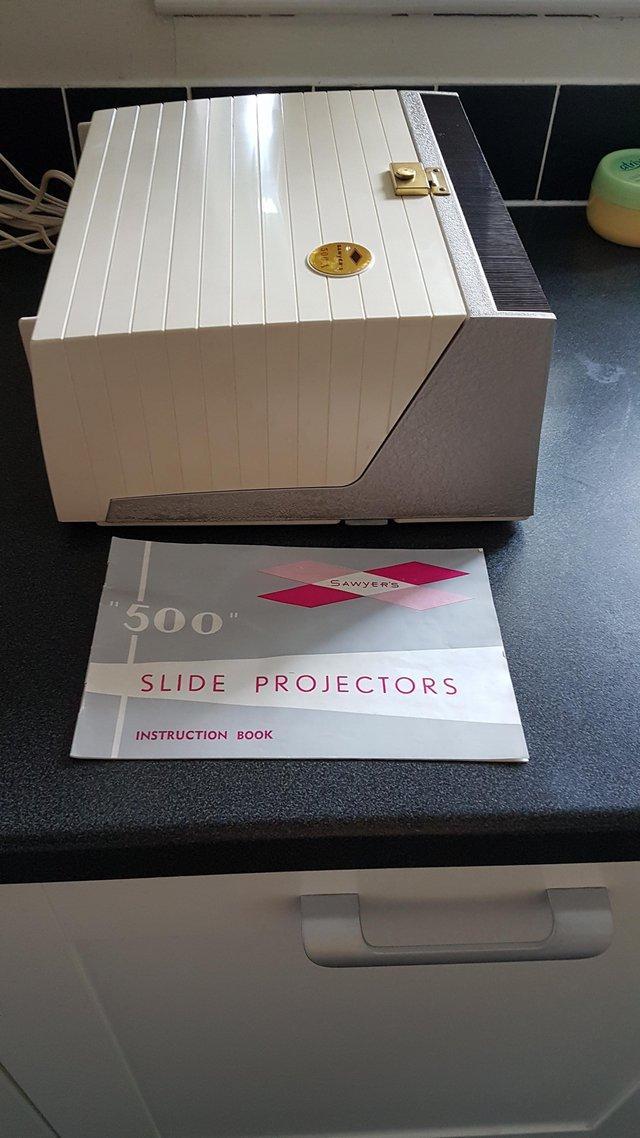 Preview of the first image of Vintage Sawyers 500 slide projector-in working order.