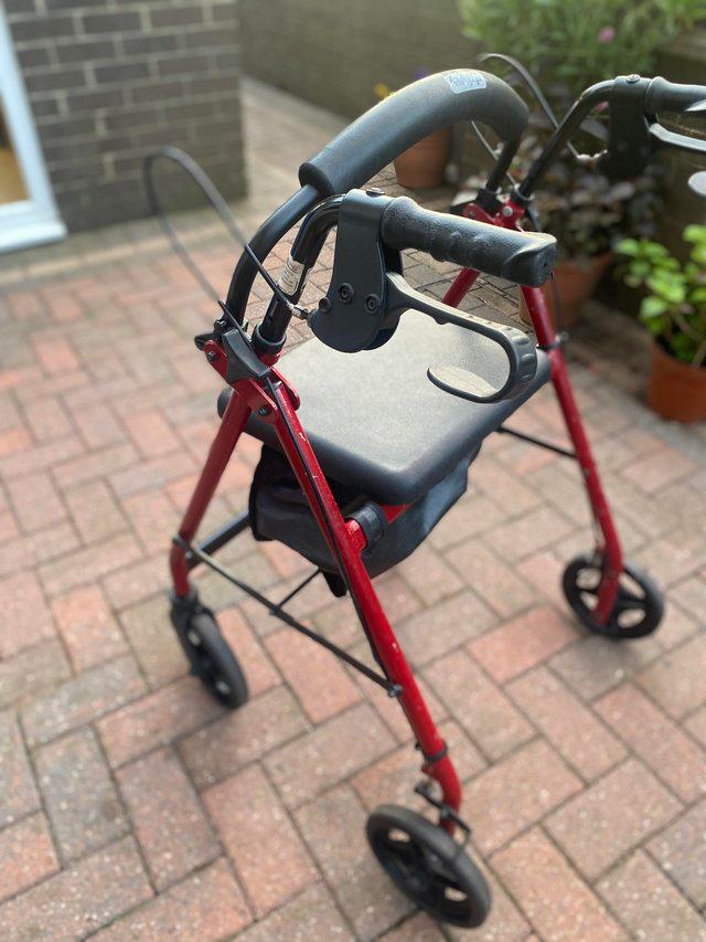 Preview of the first image of Mobility 4 wheel walker with seat and delivery.