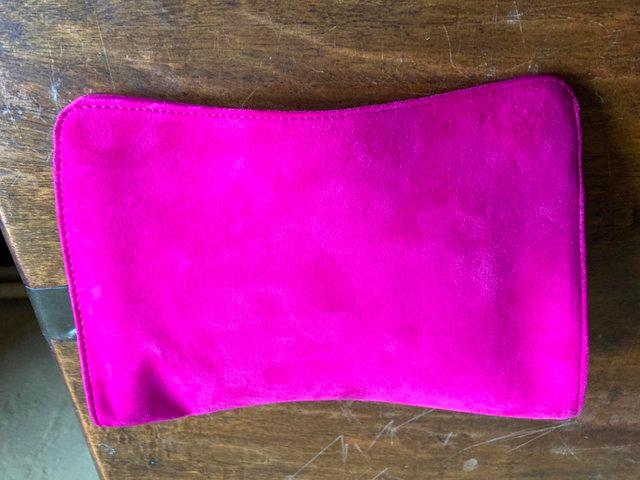Preview of the first image of Fuchsia suede clutch bag (Hobbs).