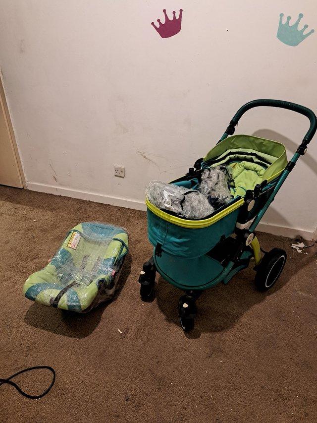 Preview of the first image of Pram and car seat with rain cover.