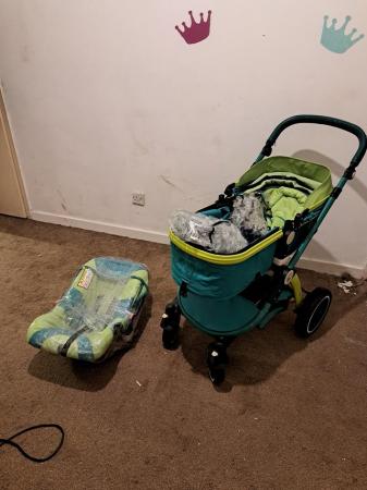 Image 1 of Pram and car seat with rain cover