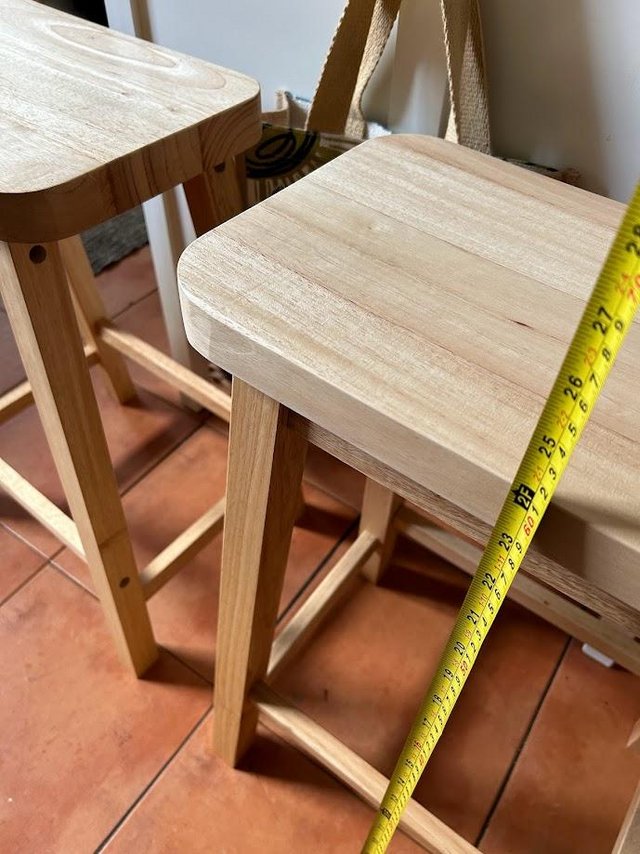 Preview of the first image of 2 x Habitat solid wood saddle bar stools - unused.