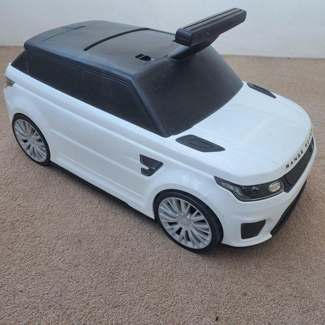 Preview of the first image of Range Rover Kids Ride On and Suit Case.