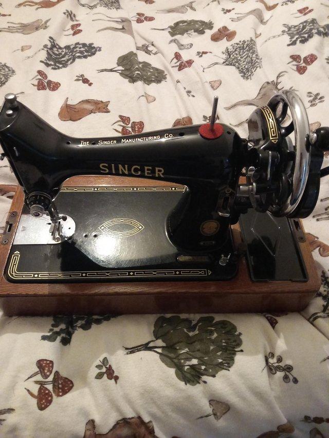 Preview of the first image of ANTIQUE SINGER SEWING MACHINE.
