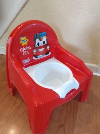 Image 1 of Red potty chair - Great condition