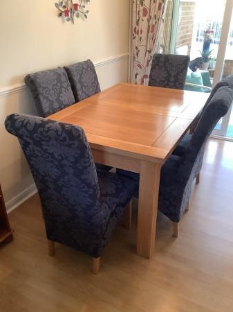 Image 1 of Dinning table and chairs