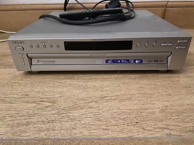 Preview of the first image of Sony 5 DVD player in silver with remote.