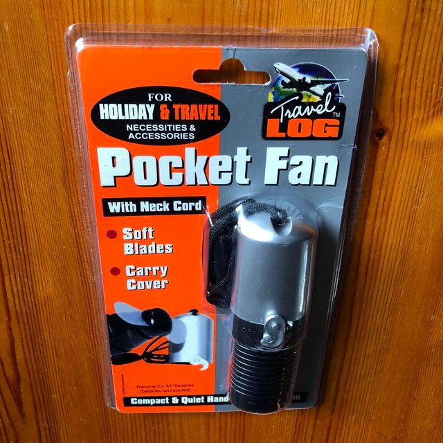 Preview of the first image of NEW POCKET FAN WITH NECK CORD AND CARRY COVER.